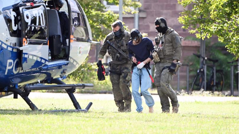 The alleged perpetrator of the knife attack in Solingen is taken by a helicopter after being brought facing court.  