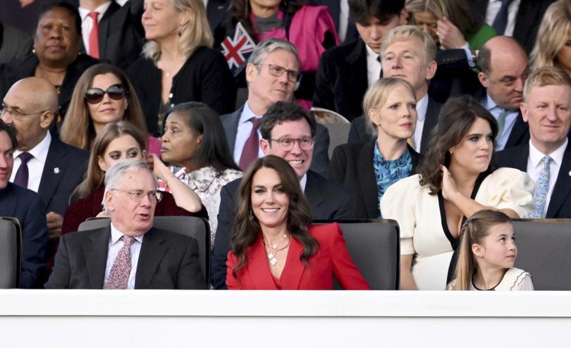 From left: Prince Richard, Duke of Gloucester, Kate, Princess of Wales and Princess Charlotte attend the concert at Windsor Castle in Windsor, England, Sunday, May 7, 2023, celebrating the coronation of King Charles III. It is one of several events over a three-day weekend of celebrations. (Leon Neal/Pool Photo via AP)