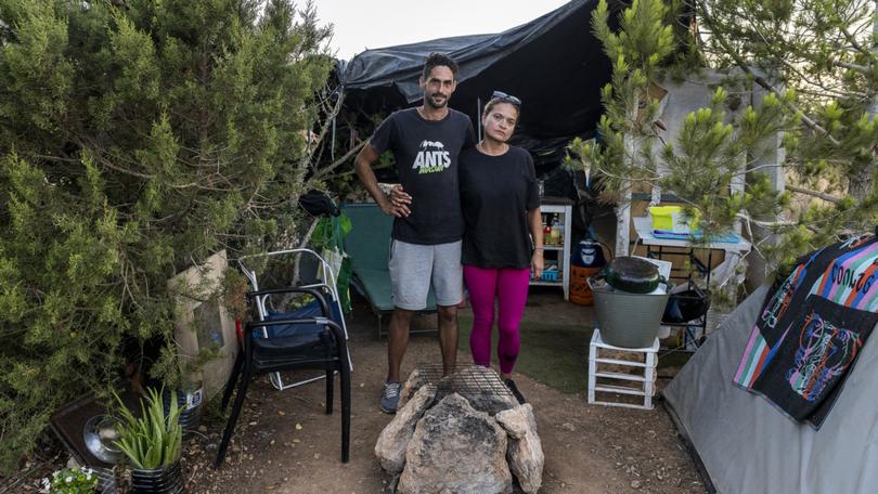 Jonathan Sanchez and Sandra Velazquez live in a tent at the Can Rova camp in Ibiza, Spain.