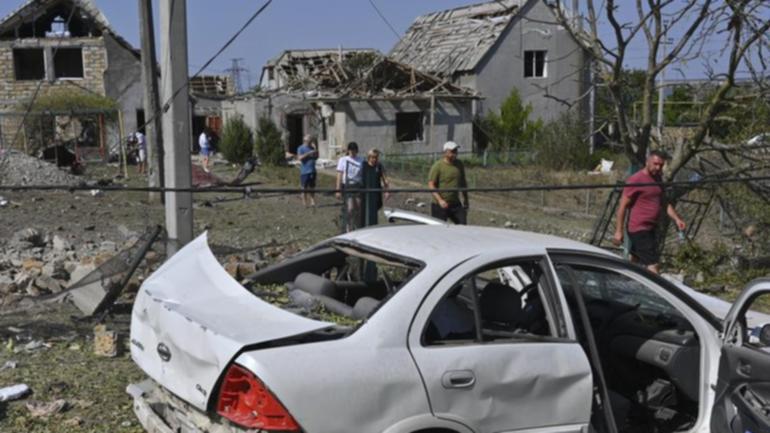 A Russian rocket attack struck a village near the Ukrainian city of Odesa, local officials say.