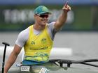 Curtis McGrath celebrates his gold medal win in canoe sprint men's Va'a single 200m in Tokyo. (AP PHOTO)