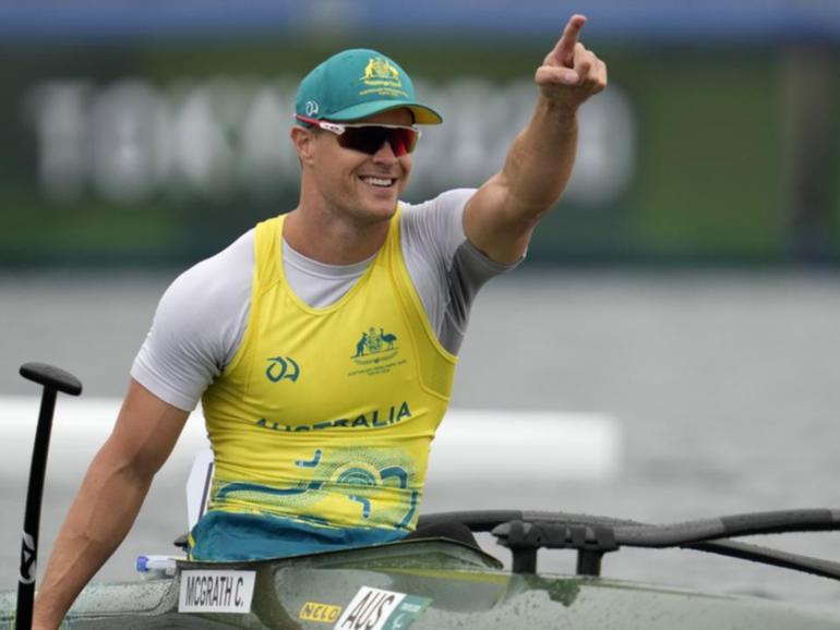 Curtis McGrath celebrates his gold medal win in canoe sprint men's Va'a single 200m in Tokyo. (AP PHOTO)