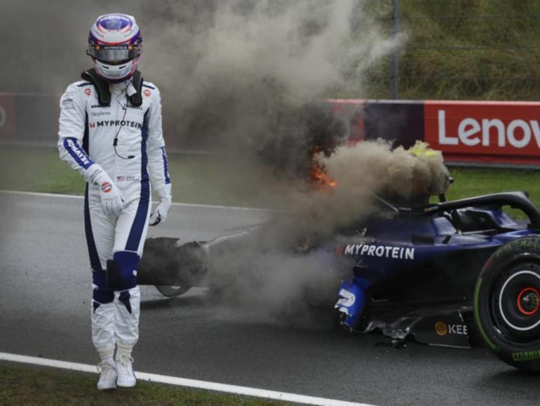 Logan Sargeant walks away from his Williams after he crashed during practice at Zandvoort. (AP PHOTO)