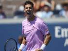 Thanasi Kokkinakis celebrates winning a key point in his win over Stefanos Tsitsipas.