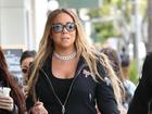 Pop superstar Mariah Carey is mourning the death of her mother and sister, who died the same day. (AP PHOTO)