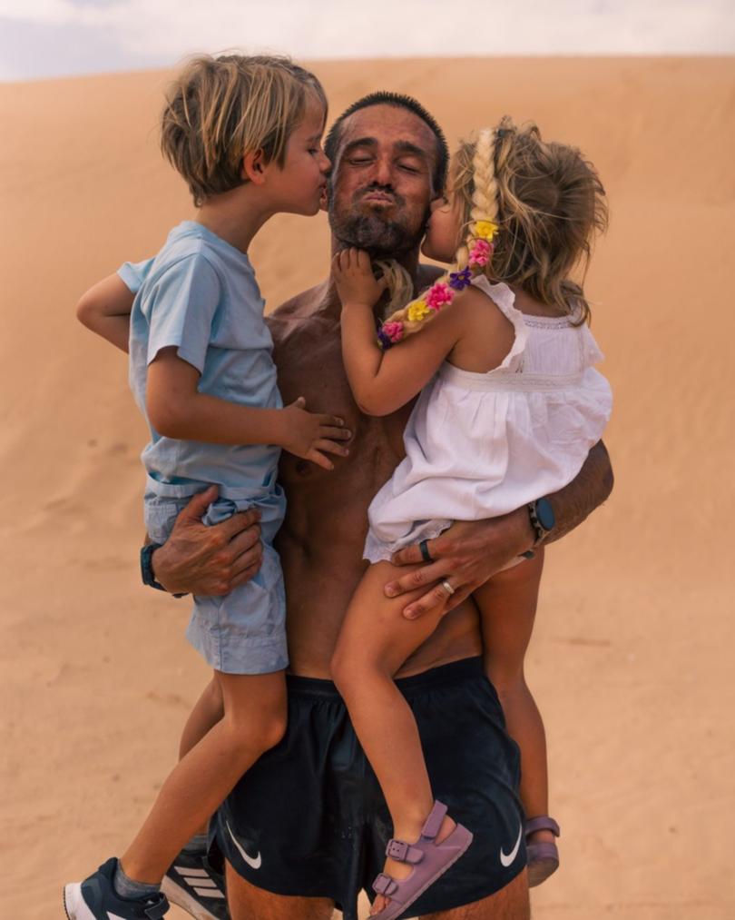 Spencer Matthews gets a kiss from his children Theodore and Gigi.