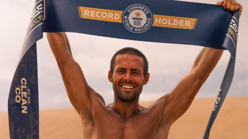 Spencer Matthews celebrates the finish of his charity challenge.