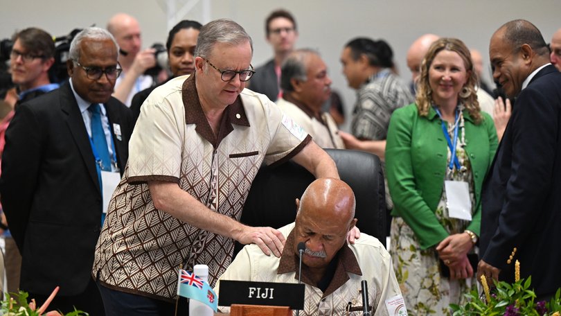 Australian Prime Minister Anthony Albanese gets up close and personal with the Prime Minister of Fiji Sitiveni Rabuka.