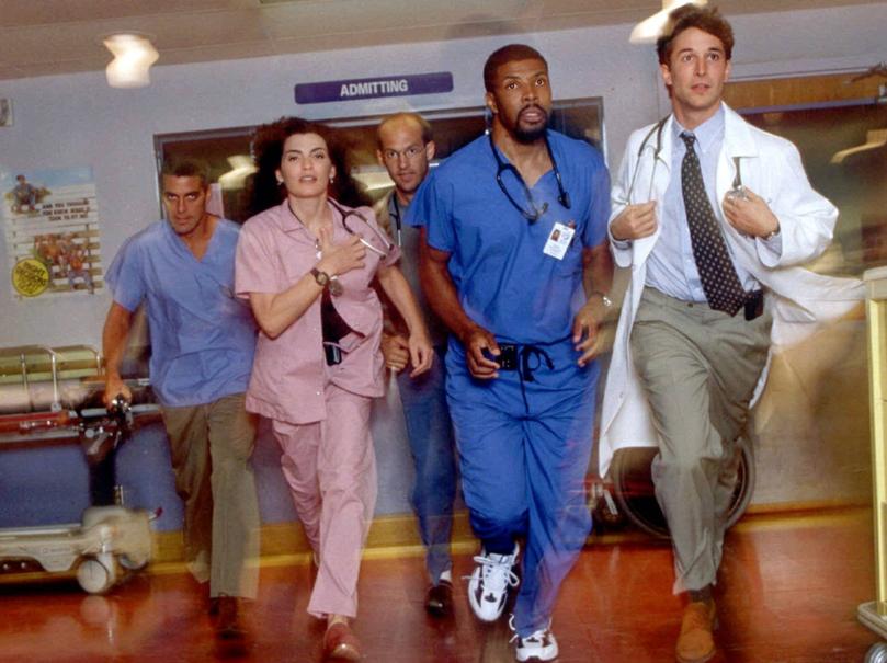 FILE--"ER" cast members from left, George Clooney, Julianna Margulies, Anthony Edwards, Eriq La Salle and Noah Wyle, rush through an emergency room set during a rehearsal for the NBC show's live season premiere on Sept. 25, 1997. "ER," has been nominated for Best Drama in a television series in the Golden Globes, scheduled for Sunday, Jan. 18, 1998. (AP Photo/NBC, Sven Arnstein)