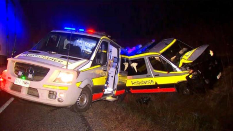 Two ambulances collided en route to the scene of the truck crash..