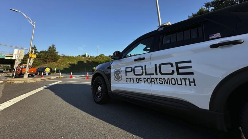A man connected to a homicide was fatally shot by police on a bridge in Portsmouth, New Hampshire.
