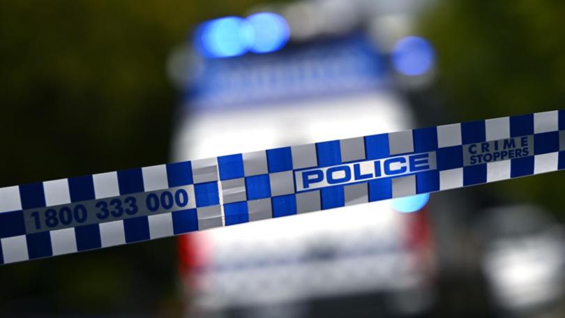 A 41-year-old man has been charged with murder over the deaths of two people at a Brisbane home. (Joel Carrett/AAP PHOTOS)