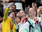 Silver medallist Phelipe Andrews Melo Rodrigues of Brazil, gold medallist Thomas Gallagher and bronze medalist Rowan Crothers of Team Australia take a selfie.