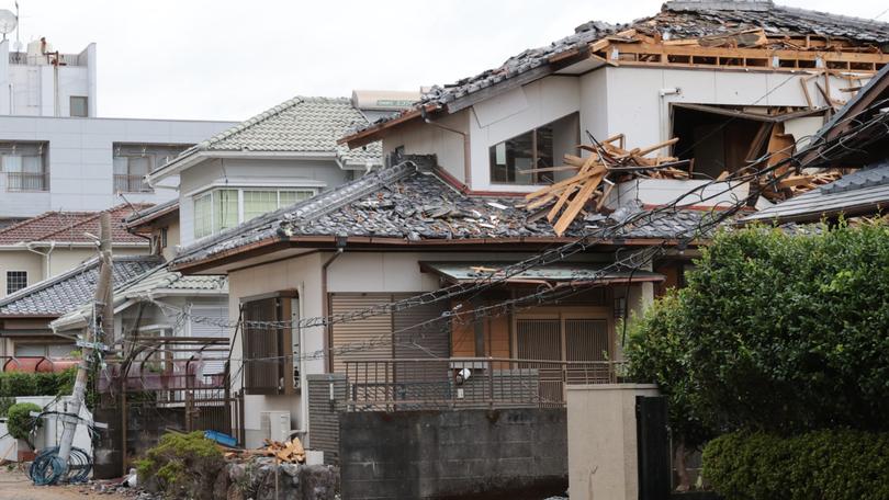 A house is damaged in Miyazaki City on August 30, 2024, by Typhoon Shanshan.