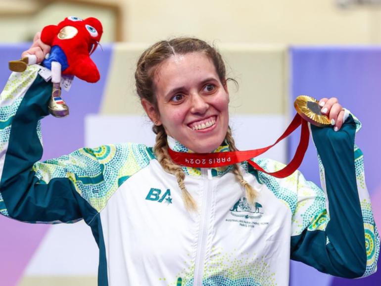 AmandaReid of Australia on the podium after winning gold in the C1-3 500m time trial. (Greg Smith/AAP PHOTOS)