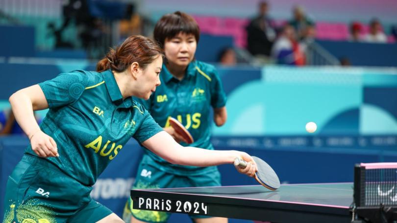 QianYang (left) and LinaLei of Australia in action against Brazil. (Greg Smith/AAP PHOTOS)