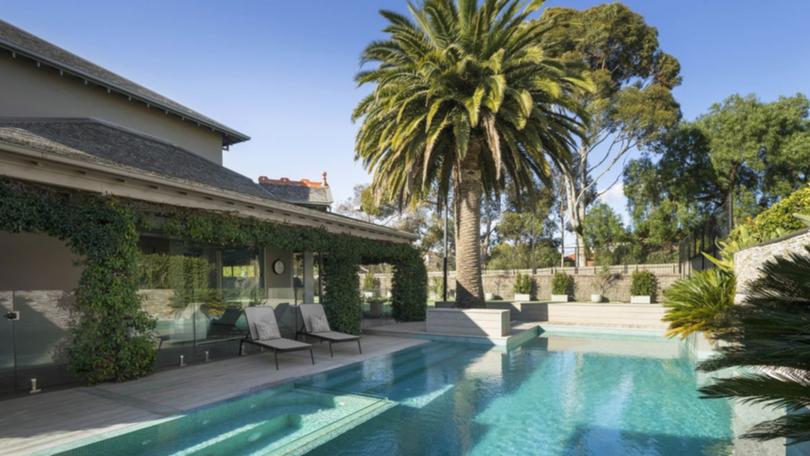 The home in the Melbourne bayside suburb of Brighton has a pool and tennis court.