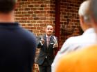 An auctioneer conducts bidding during an auction of a property in the suburb of Roseville in Sydney, Australia, on Saturday, Oct. 18, 2014. Sydneyís median home price rose 14 percent from a year earlier in September to A$655,000 ($568,900), an RP Data CoreLogic Home Value Index showed Oct. 1. Photographer: Brendon Thorne/Bloomberg