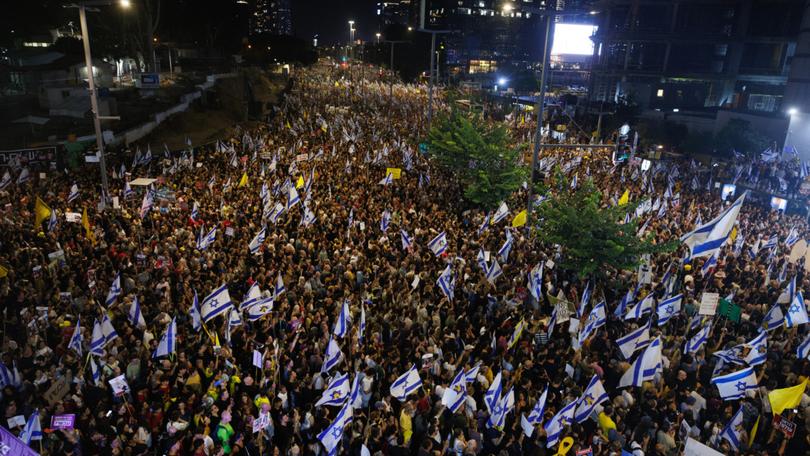 Israelis protest for hostage release and against the government during a demonstration in Tel Aviv, Israel, on Sunday.