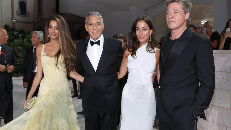 Amal Clooney, George Clooney, Brad Pitt and Ines de Ramon attend the Wolfs red carpet.