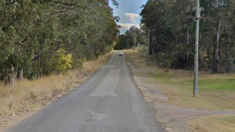 A woman has been killed in a crash west of Newcastle.