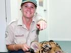 Tiger handler mauled identified. 