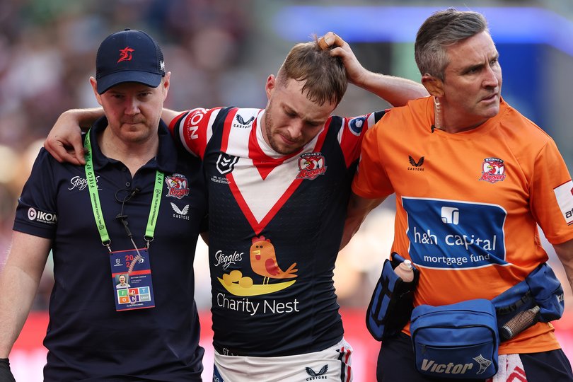 SYDNEY, AUSTRALIA - SEPTEMBER 01: Sam Walker of the Roosters is carried off the ground with a leg injury during the round 26 NRL match between Sydney Roosters and Canberra Raiders at Allianz Stadium, on September 01, 2024, in Sydney, Australia. (Photo by Cameron Spencer/Getty Images)