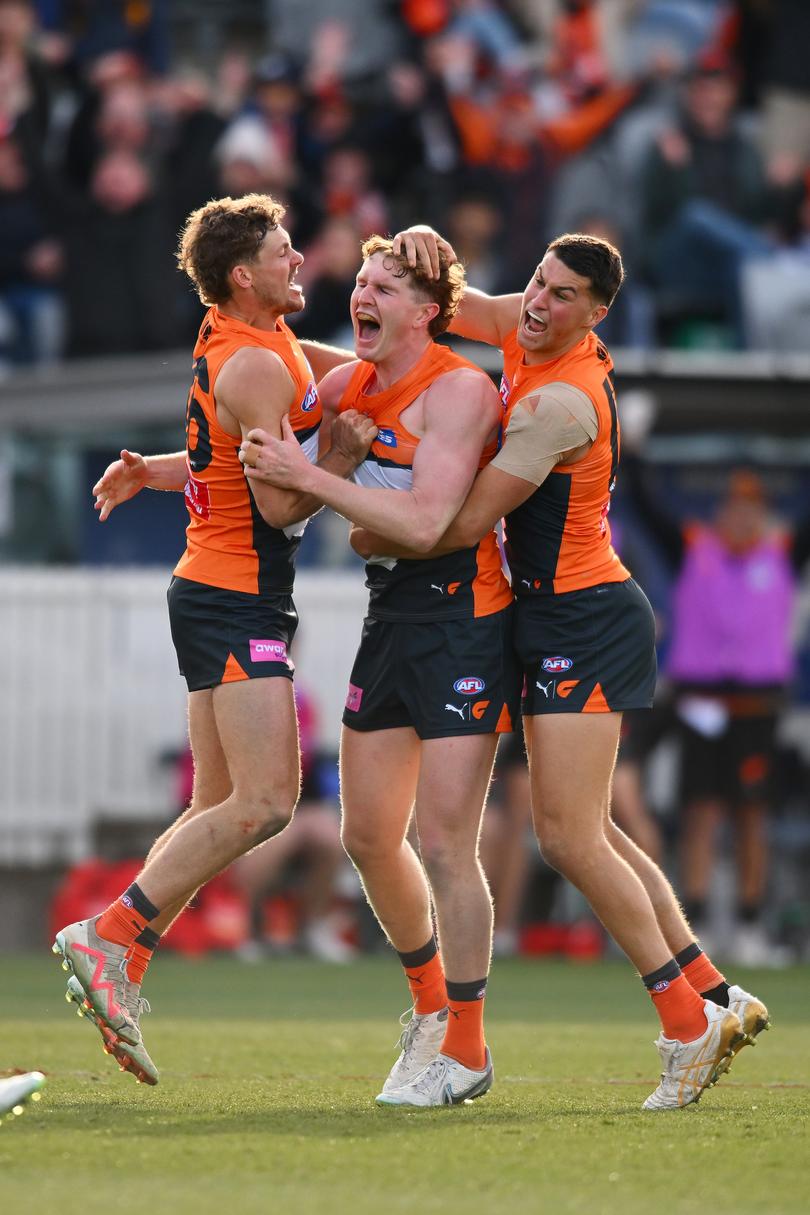 CANBERRA, AUSTRALIA - AUGUST 04: Tom Green of the Giants celebrates a goal during the round 21 AFL match between Greater Western Sydney Giants and Hawthorn Hawks at Manuka Oval, on August 04, 2024, in Canberra, Australia. (Photo by Morgan Hancock/Getty Images)