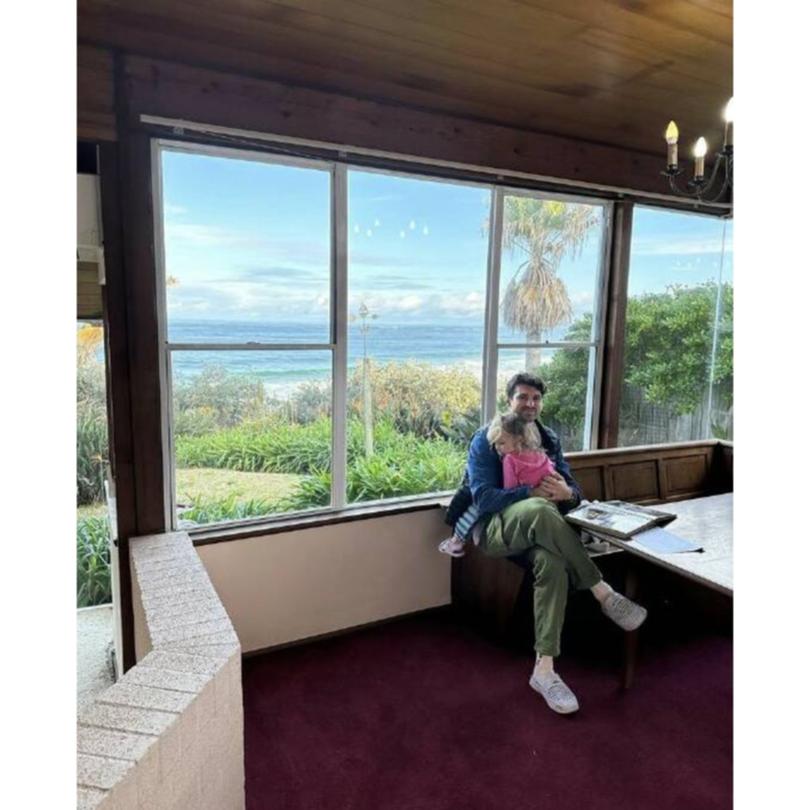 Matty J takes a seat in his new dining room.