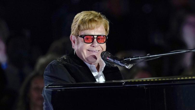 Singer Elton John says his recovery from an eye infection will take some time. (AP PHOTO)