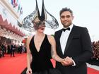 Lady Gaga and Michael Polansky attend the Joker: Folie à Deux red carpet during the 81st Venice International Film Festival at Sala Grande.