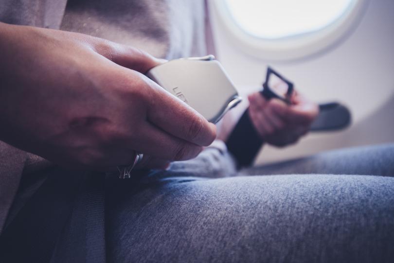 Airplane seat buckles are not like car seat belts. 