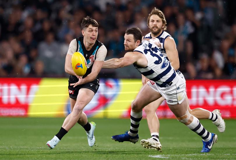 ADELAIDE, AUSTRALIA - SEPTEMBER 05: Zak Butters of the Power and Patrick Dangerfield of the Cats in action during the 2024 AFL Second Qualifying Final match between the Port Adelaide Power and the Geelong Cats at Adelaide Oval on September 05, 2024 in Adelaide, Australia. (Photo by Michael Willson/AFL Photos via Getty Images)