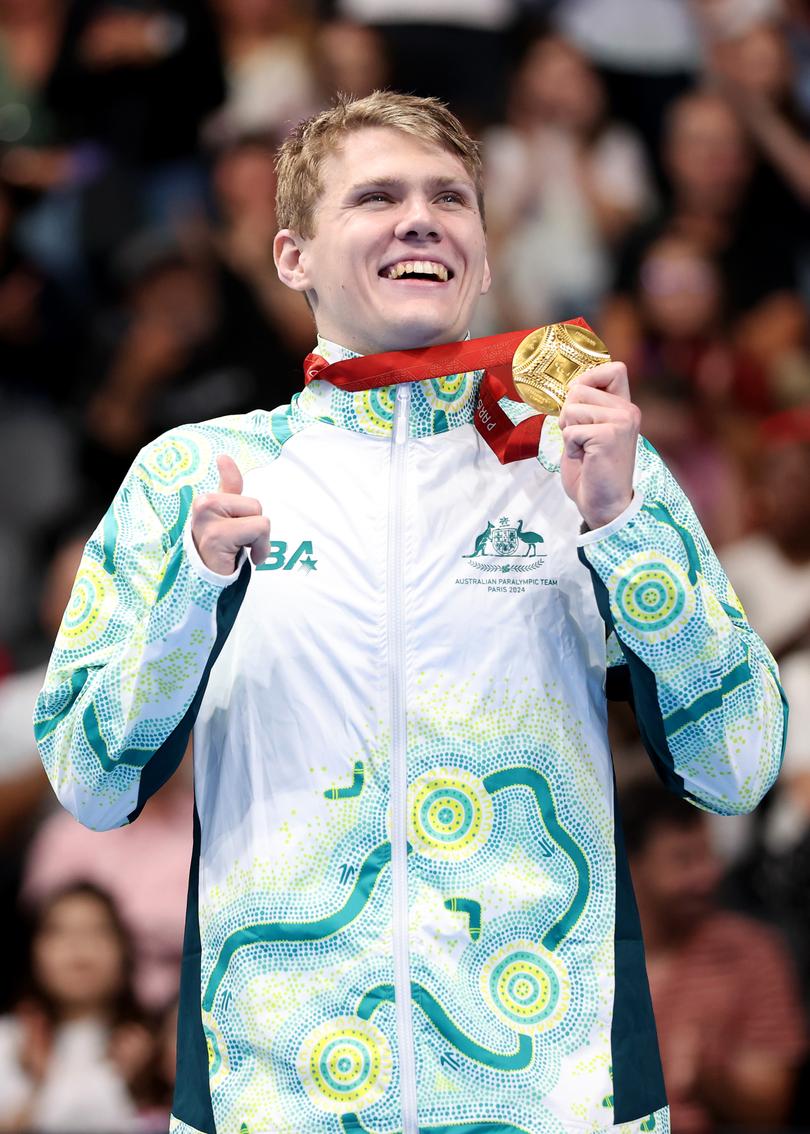 NANTERRE, FRANCE - SEPTEMBER 05: Gold medalist Timothy Hodge of Team Australia poses for a photo during the Para Swimming Men's 200m Individual Medley SM9 Medal Ceremony on day eight of the Paris 2024 Summer Paralympic Games at Paris La Defense Arena on September 05, 2024 in Nanterre, France. (Photo by Sean M. Haffey/Getty Images)