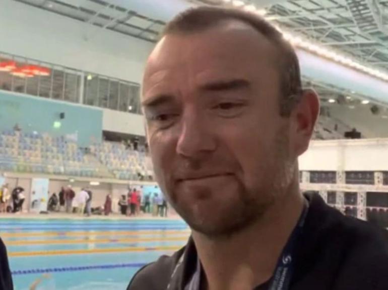 Swimming Australia has sacked coach Michael Palfrey.