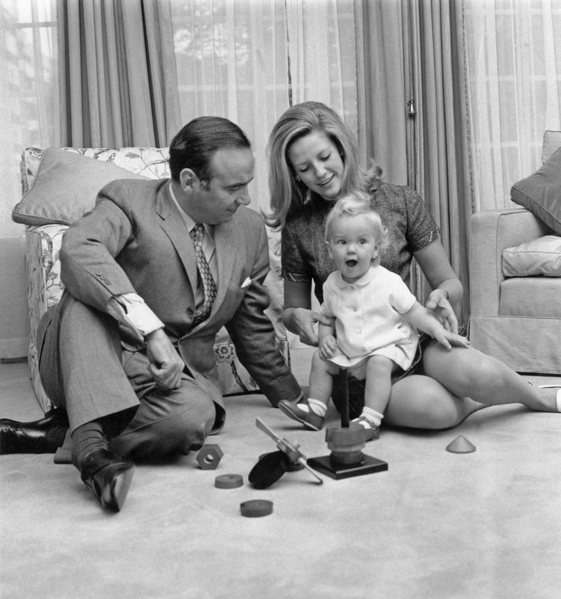 Australian media mogul Rupert Murdoch with his second wife Anna Maria Torv and their 14-month old daughter Elisabeth at their home in Sussex Gardens, London, 4th October 1969. Murdoch has recently been interviewed by David Frost on his 'Frost On Friday' programme on the controversy surrounding the publication of Christine Keeler's memoirs in Murdoch's News Of The World newspaper. (Photo by Chris Ware/Keystone/Hulton Archive/Getty Images)