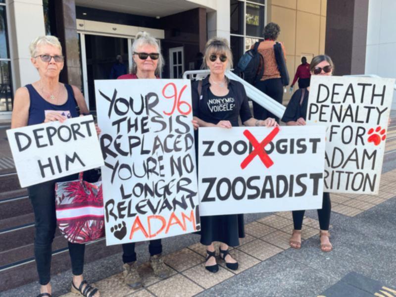 Animal advocates demonstrate before Adam Britton's sentencing