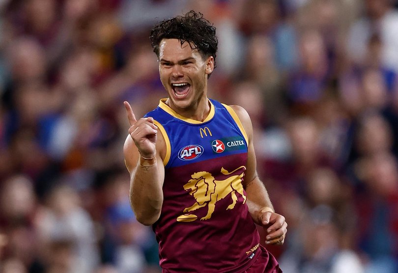 Cam Rayner of the Lions celebrates a goal.