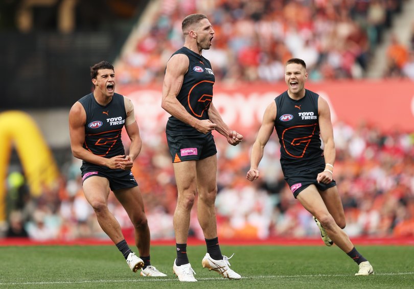 SYDNEY, AUSTRALIA - SEPTEMBER 07: Jesse Hogan of the Giants celebrates with team mates after kicking a goal during the AFL First Qualifying Final match between Sydney Swans and Greater Western Sydney Giants at Sydney Cricket Ground, on September 07, 2024, in Sydney, Australia. (Photo by Matt King/AFL Photos/via Getty Images)
