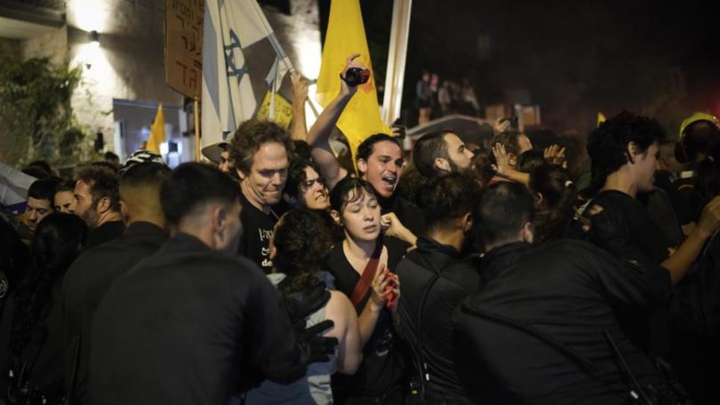 A rare general strike was held across Israel, with protesters demanding a cease-fire deal. (AP PHOTO)