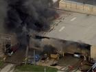 The body of a man has been found after a warehouse went up in flames.