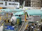 Boeing has agreed with a union demand to build its next plane in the US state of Washington.