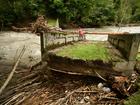 A resident stands on a broken bridge in Cette-Eygun in France’s south-west after flooding caused by the waters of the Gave d'Aspe following heavy rain.