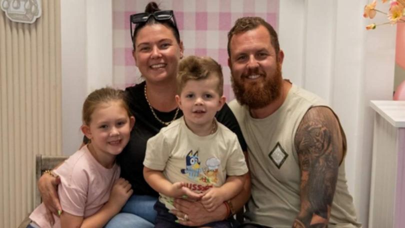 AJ with his big sister Elle and his parents Ashlea and Joel.