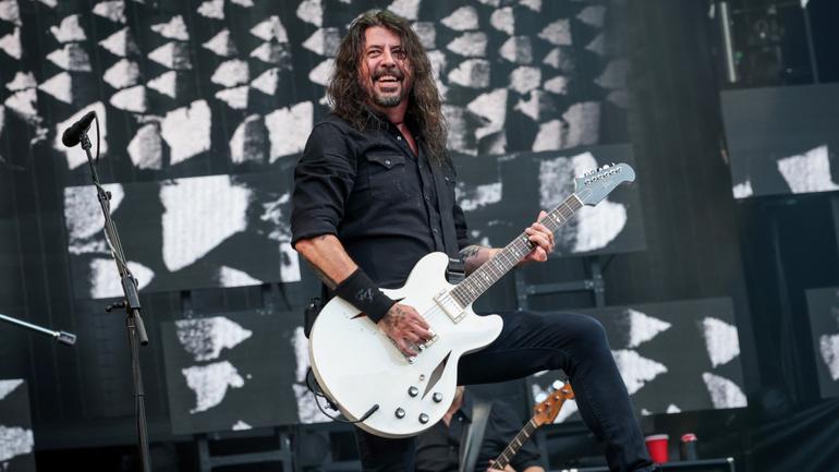 Dave Grohl of The Foo Fighters performs on stage at London Stadium.