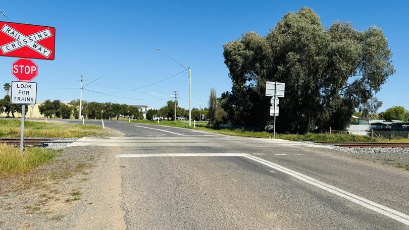 The 'passive' railway crossing where Ethan Griffiths died on September 2. Family believe the setting sun was a factor in his death.