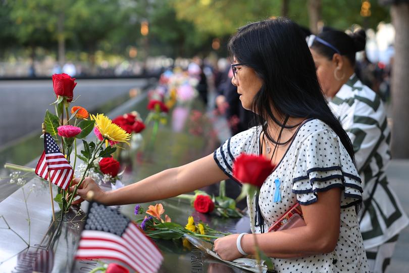  Family and friends of the victims of the 9/11 terror attack attend the annual 9/11 Commemoration Ceremony at the National 9/11 Memorial and Museum on September 11, 2024 in New York City. 