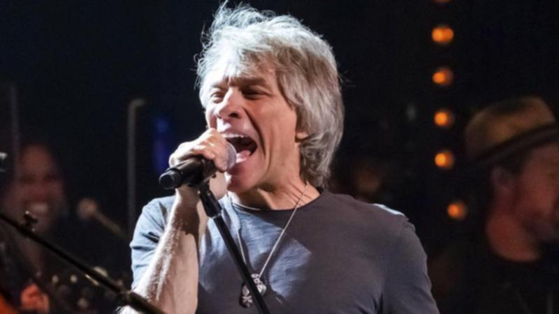 Rocker Jon Bon Jovi helped a woman back off a bridge ledge in the US.