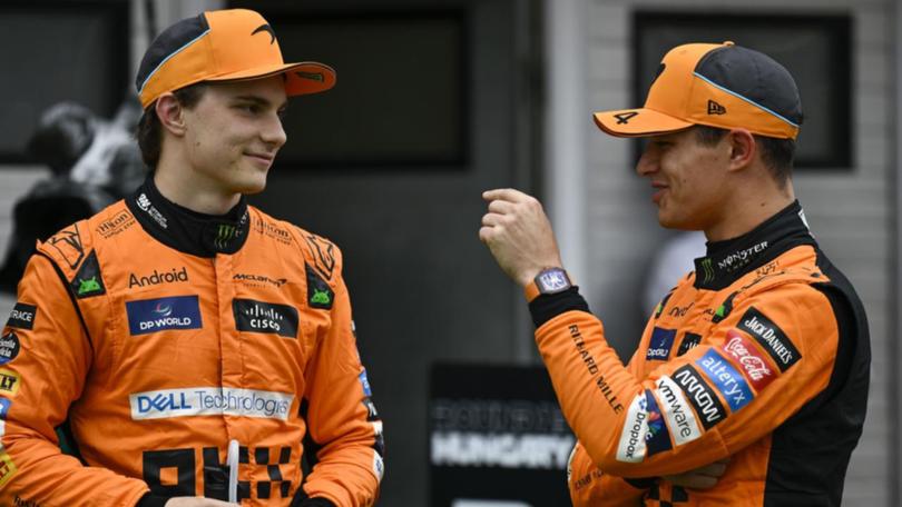 McLaren drivers Oscar Piastri (left) and  Lando Norris both want what's best for their team. (AP PHOTO)