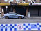 A group of people were inside the tobacco shop at the time of shooting, police say. (Joel Carrett/AAP PHOTOS)